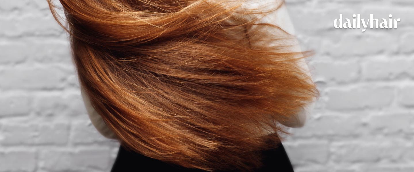 Woman's brown hair on a white background